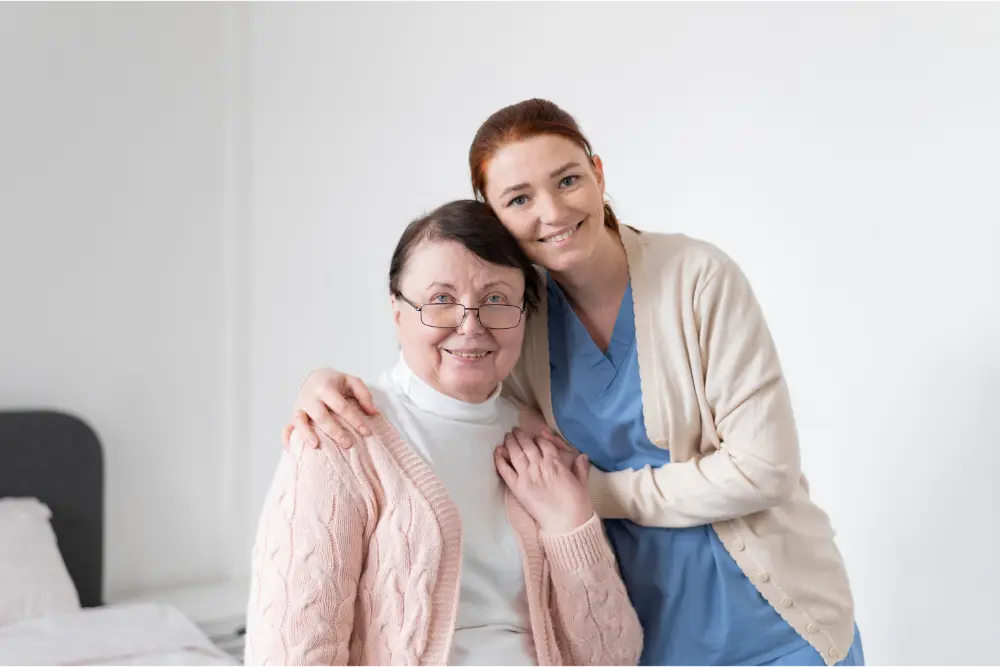 carer looking after elderly person