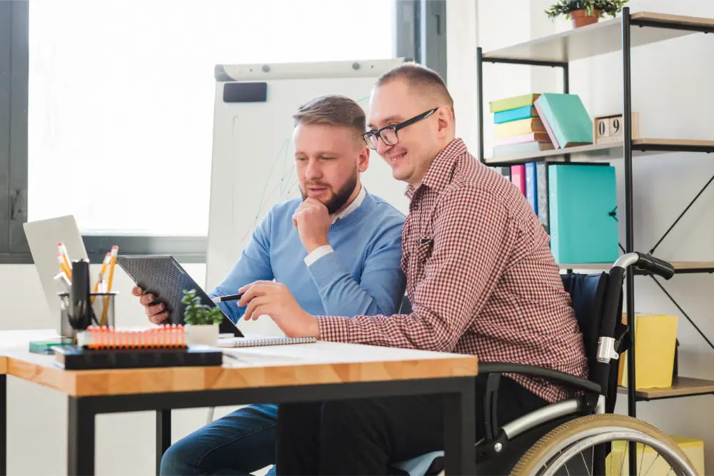 positive disabled worker together with manager office